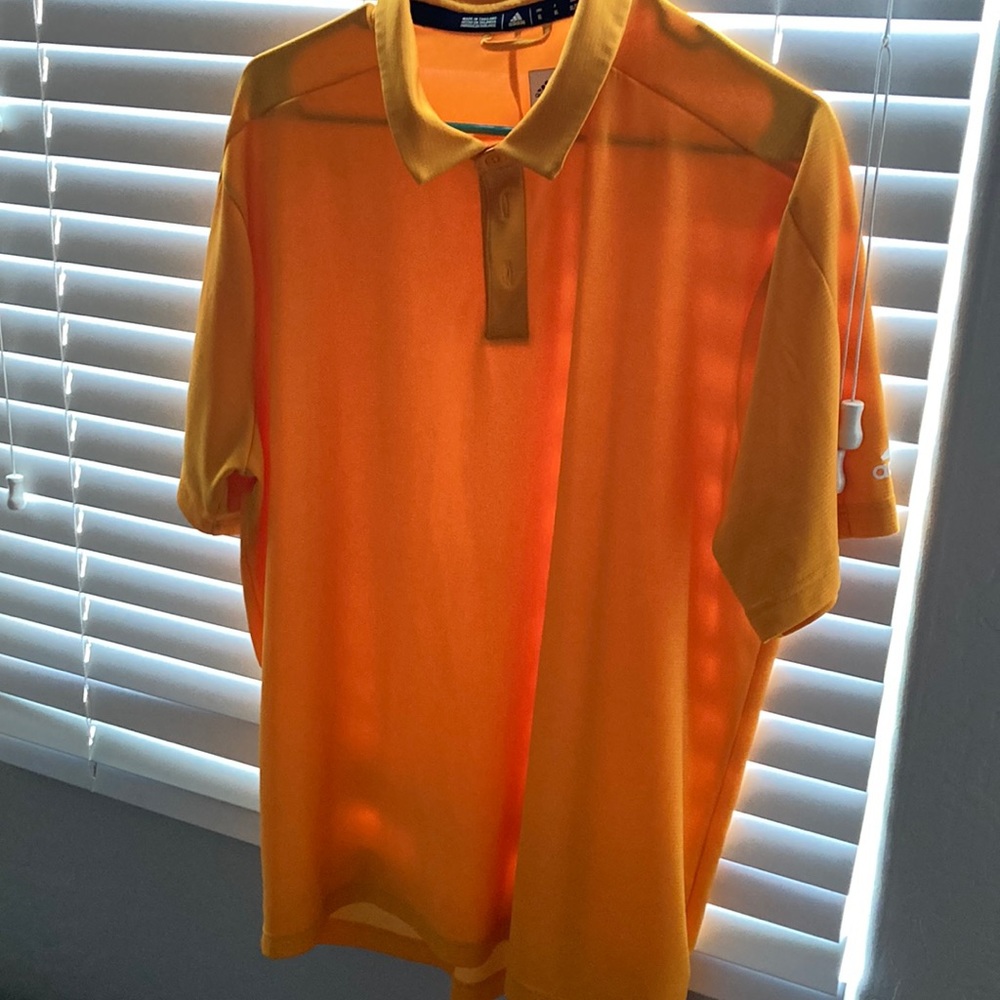 Goldish-yellowish Adidas polo
